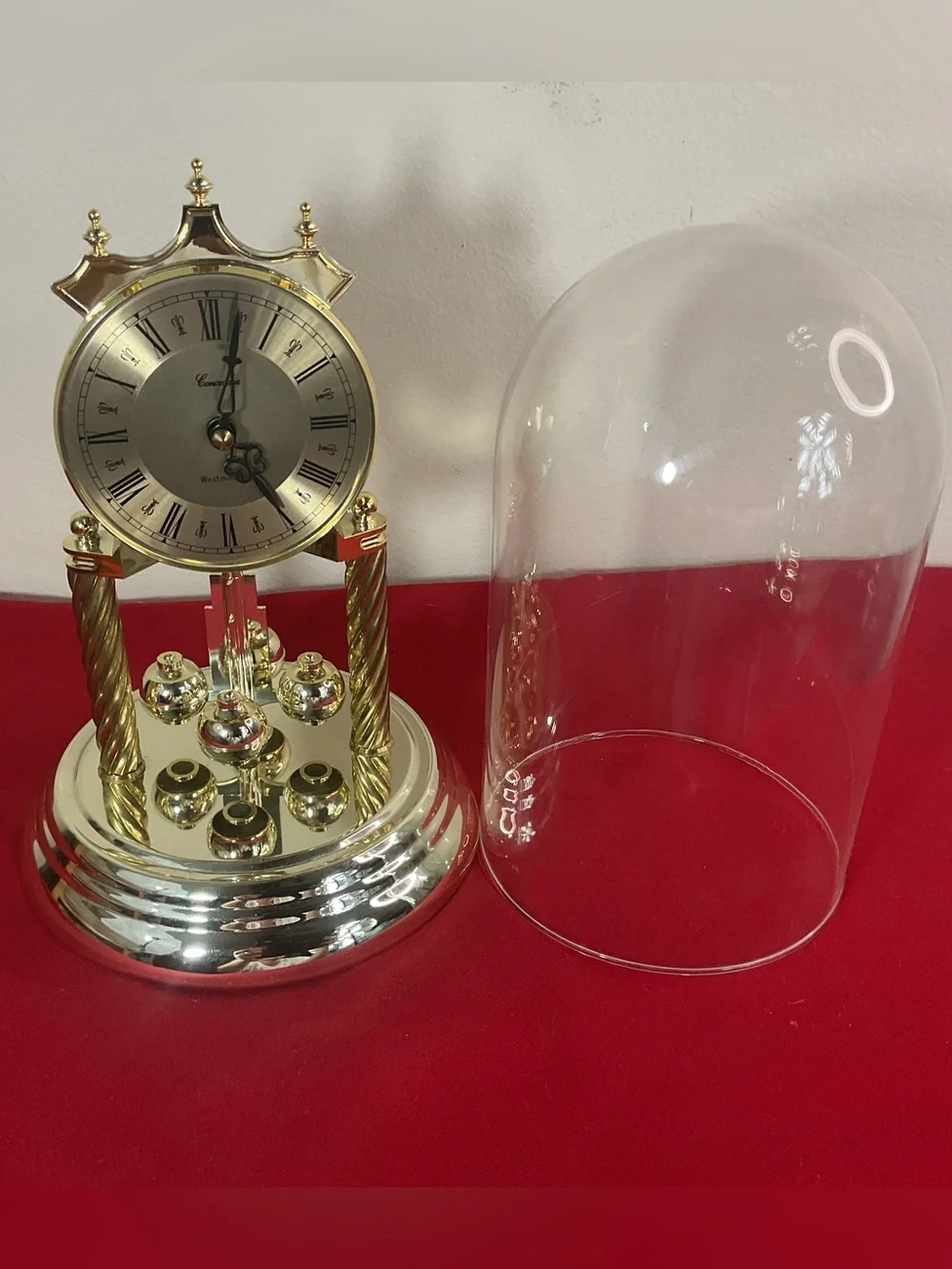 Concordia Anniversary Clock Glass Dome Quartz Rotating Pendulum Mantel Germany….